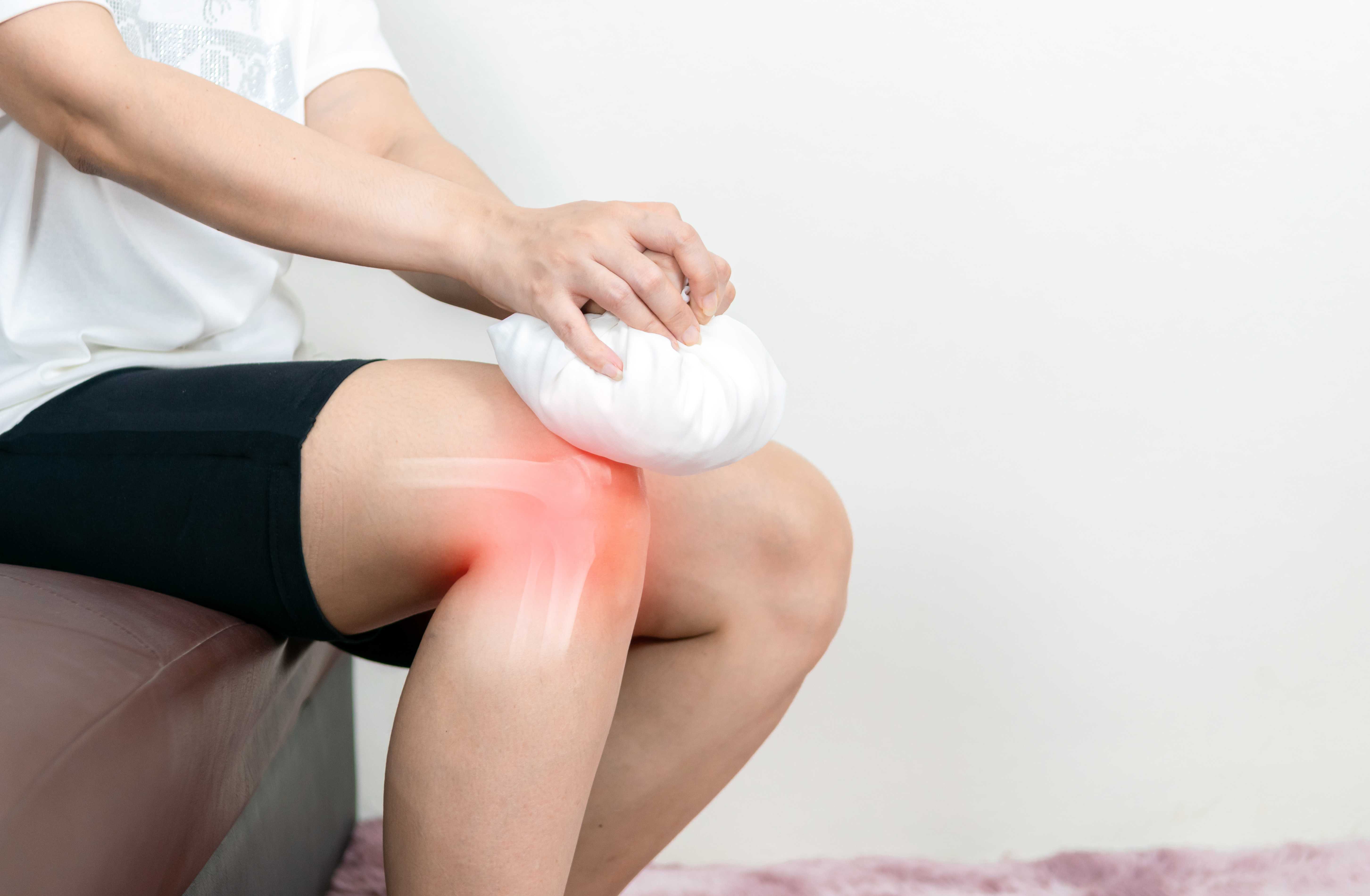 Close-up of a knee joint exam during a regenerative medicine consultation in Portsmouth, NH