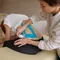 Pain management specialist reviewing a spine model in Portsmouth, NH