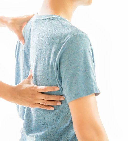 Dr. Greenspan reviewing a patient's imaging before pain treatment