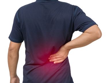 Interventional pain specialist preparing a spinal injection for sciatica relief in Portsmouth, NH